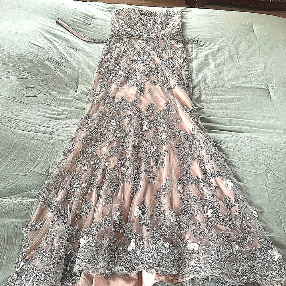 Elegant gown with alot of details boutique style